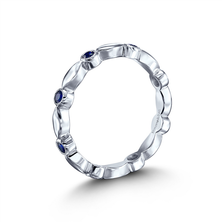 14K White Gold Sapphire Motif Wedding Band - 0.30ctw.