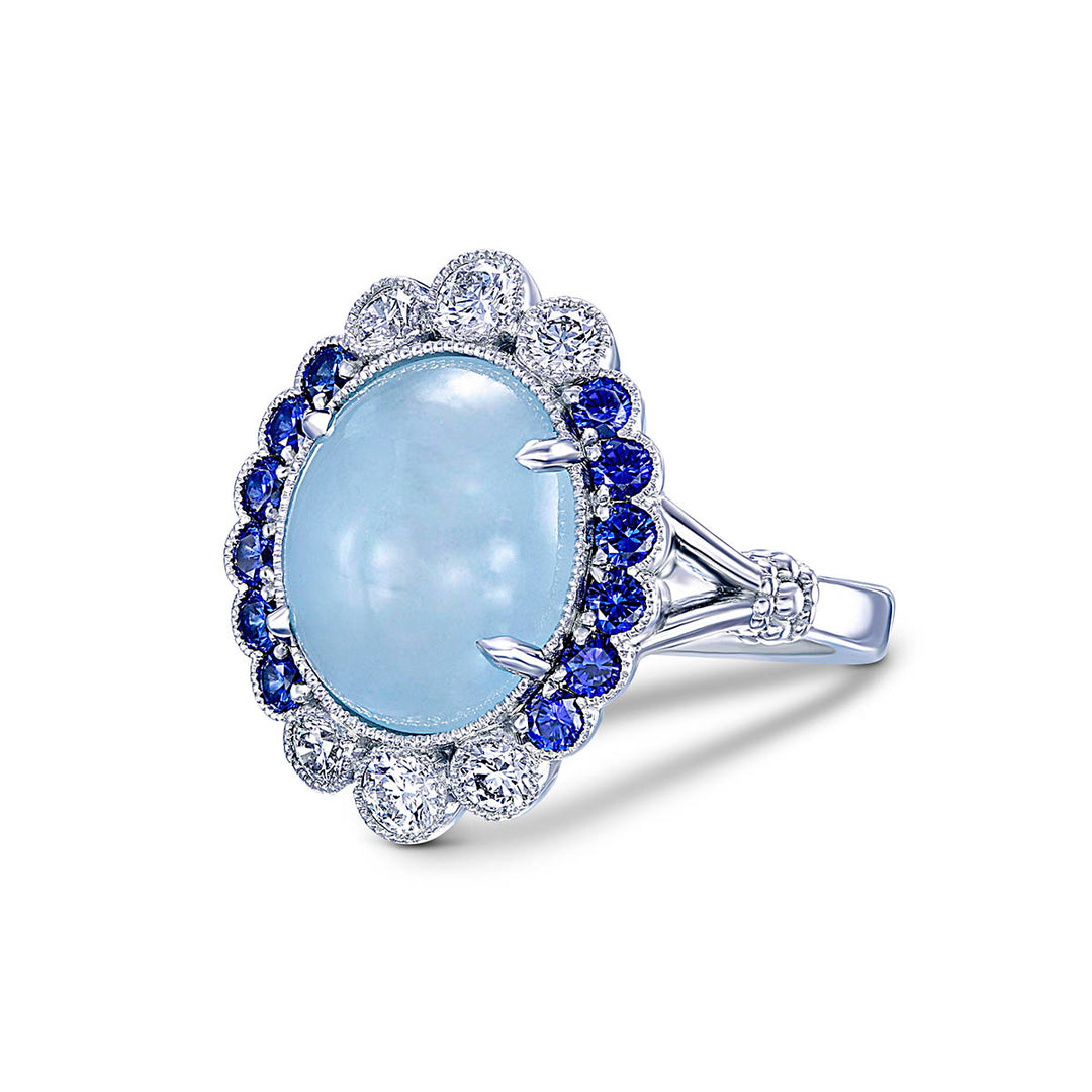 14k White Gold Ring - Featuring a 4.78ct Aquamarine With A Diamond And Sapphire Halo