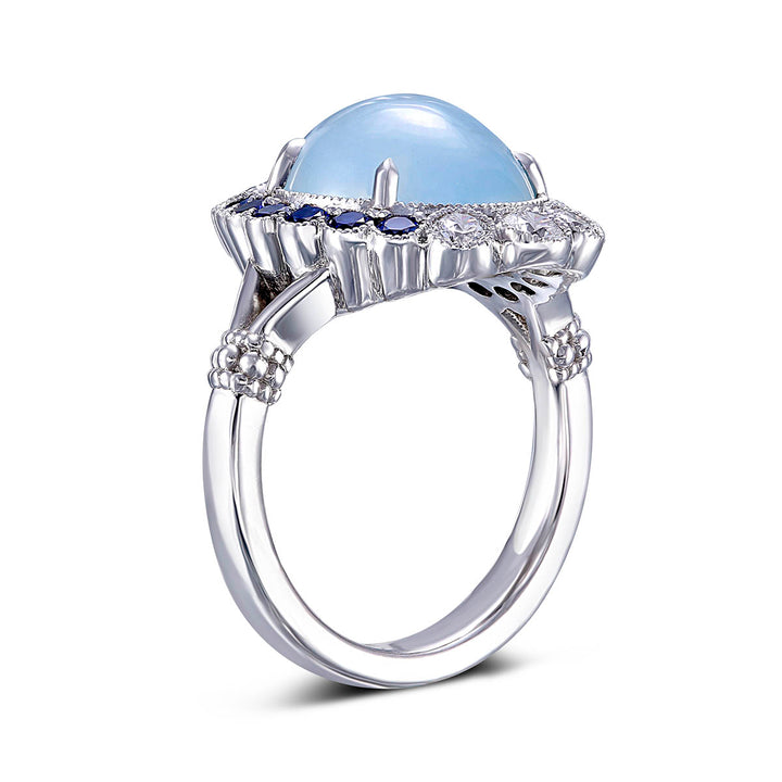 14k White Gold Ring - Featuring a 4.78ct Aquamarine With A Diamond And Sapphire Halo