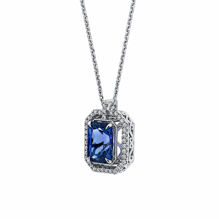 14K White Gold Pendant set with a 4.92ct Tanzanite & Diamond Halo